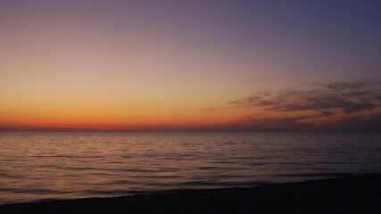 Beautiful red orange sunset under sea surface. panorama. banner. copy space. Sea landscape. summer, holidays, vacation, travel, nature, romantic getaway, tourism concept