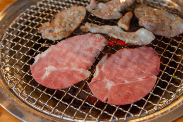 Raw beef on grille for barbecue Japanese style or yakiniku