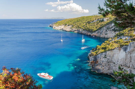 Picturesque view on turquoise Careta Trampolino rocky beach. It is situated on the north east coast of Zakynthos island on Ionian Sea, Greece.