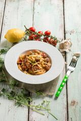 fettuccine with cep mushroom tomato and lemon peel