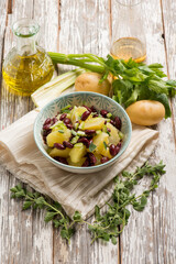 potatoes salad with red beans oregano and celery