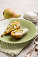Fototapeta na wymiar oven pears with mozzarella and pistachio