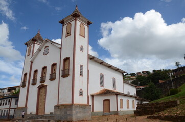 Fototapeta premium Mother Church called Nossa Senhora da Imaculada Conceição at Serro/MG with blue sky in a sunny day