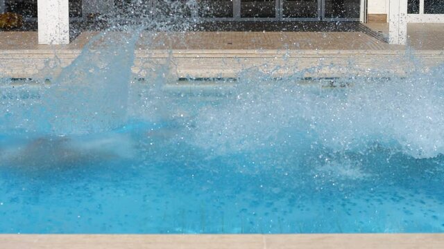 summer, fun - four friends taking a run and diving into the pool