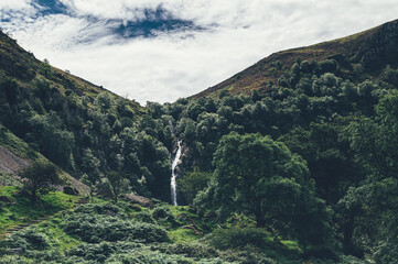 Naklejka premium Aber Falls or in Welsh Rhaeadr Fawr is waterfall located about two miles south of the village of Abergwyngregyn, Gwynedd, Wales