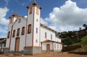 Fototapeta premium Mother Church called Nossa Senhora da Imaculada Conceição at Serro/MG with blue sky in a sunny day