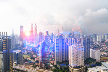 World planet Earth map hologram over panorama city view of Kuala Lumpur, Malaysia, Asia. The concept of international connections and business. Multi Exposure.