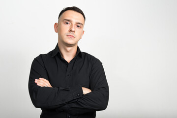 Portrait of handsome businessman against white background