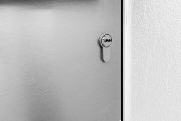 Close up of a lock on a door of a modern house. Security concept. Copy space