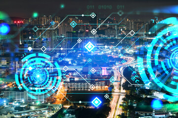 Information flow hologram, night panorama city view of Kuala Lumpur. KL is the largest technological center in Malaysia, Asia. The concept of programming science. Double exposure.