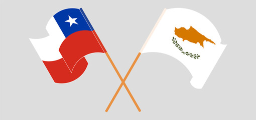 Crossed and waving flags of Cyprus and Chile