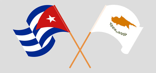 Crossed and waving flags of Cyprus and Cuba