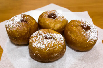 Fresh sufgniyot in a cardboard box for the Jewish holiday of Hanukkah
