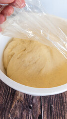 dough rising in a bowl