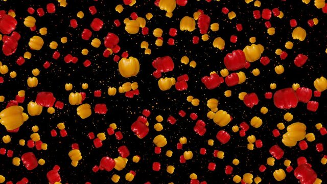 Red and yellow peppers rotate and fall on a black background