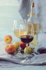 Wine, peaches and pears on the table, summer, autumn season, home cooking