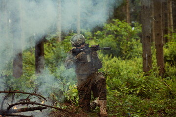 soldier in action aiming  on weapon  laser sight optics