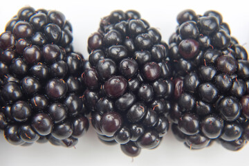 blackberries on white background. useful vitamin healthy food fruit. healthy vegetable breakfast