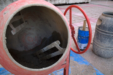 concrete mixer with cement in interior patio