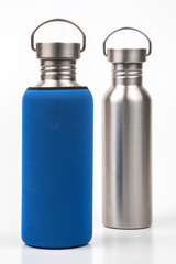 metal steel water flasks on white background. metal drinking utensils
