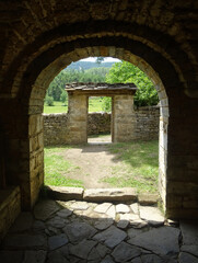 Obraz premium Main door of the Mozarab Romanesque Church of Santa Eulalia in the village of Susín. 11th century. Serrablo Region. Aragón. Spain. 