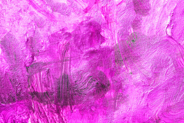 The texture of lilac pearlescent paint on canvas. Purple paint close up.