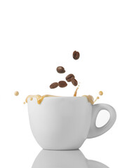 Cup of coffee with grains and splash on white