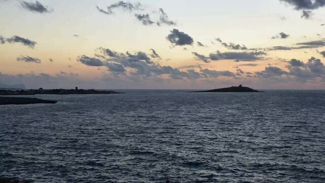 sunset over the sea. Isola delle Femmine, Palermo.