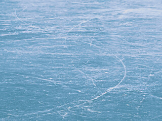 Ice rink texture, abstract blue frozen background, shallow depth of field
