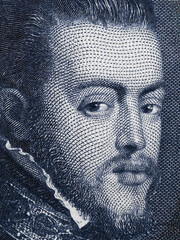 King Philip II of Spain portrait on Spanish 100 peseta (1925) banknote macro, money closeup.