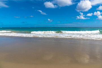Fototapeta na wymiar Water rolling on a golden sand beach, Dominican Republic, Caribbean