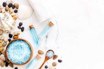 Spa set of blue sea salt, cosmetic clay and aroma oil. Top view