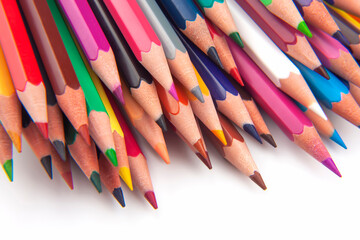 Colored pencils for drawing on a white background. Education and creativity. Leisure and art