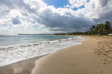 Water rolling on a golden sand beach, Dominican Republic, Caribbean