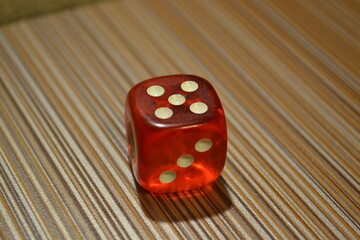 
Red cube for playing poker. View from above