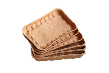 Biodegradable food trays made from pressed cardboard isolated on white background. Closeup