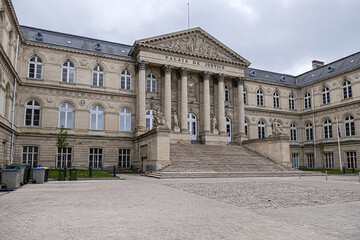 Fototapeta na wymiar AMIENS, FRANCE - MAY 26, 2019: View of Palace of Justice of Amiens. Palace of Justice (Palais de Justice, 1868 - 1880) in city center of Amiens. Somme department, Picardie, France. 