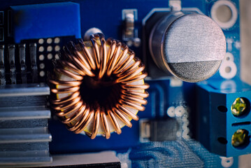 Ferrit inductance coil on electric board wrapped with copper wire