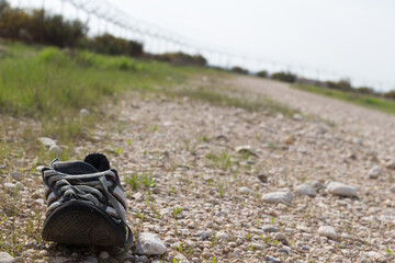 hiking boots on the field