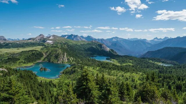 Banff, Alberta, Canada, zoom out time lapse view of lush landscape at Sunshine Meadows during summer. 