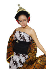 Beautiful Young Woman covering his body with Jarik. a woman using traditional javanese lurik batik and bun on hair.