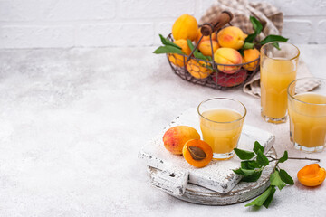 Apricot juice in glass. Healthy drink