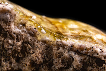 Partially molten quartz. Dirty vitrified glass material.