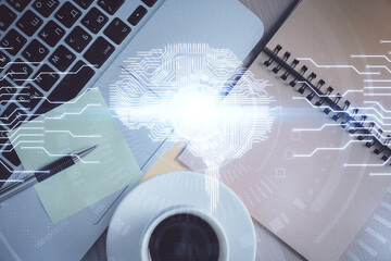 Double exposure of brain drawing hologram over topview work table background with computer. Concept of big data.