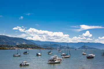 Fototapeta na wymiar Boats anchored in the marina os Paraty Mirim - Rio de Janeiro - Brazil