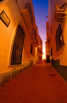 Fototapeta spanish street at sunset