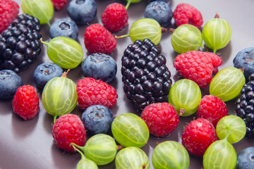 lots of fresh different berries. useful vitamin healthy food fruit. healthy vegetable breakfast