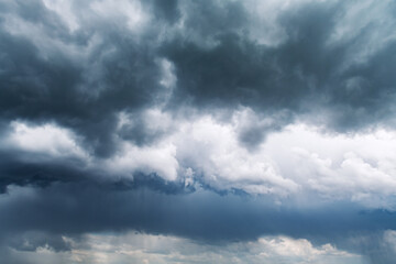 Dramatic storm clouds with rain closeup. Nature background