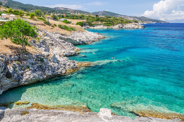 Fototapeta premium Scenic view on turquoise rocky beach situated on the north east coast of Zakynthos island, Greece.