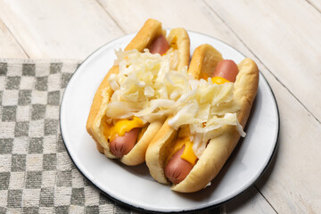 Montreal hot dog with cabbage on white background